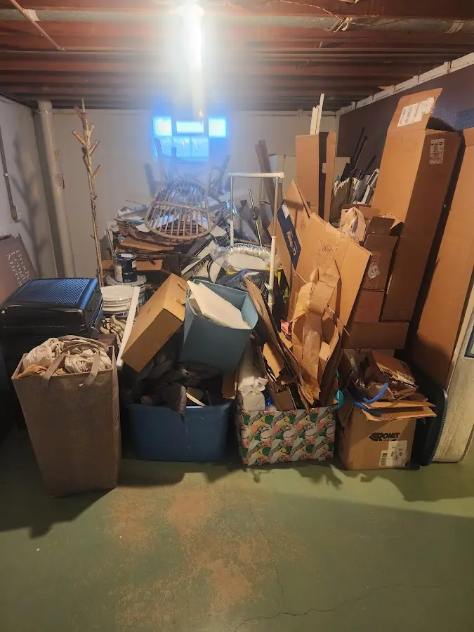 Roll-off dumpster container at job site for Yard Waste Dumpster Rental in Lake Land'Or